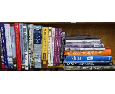 A shelf of books including warships, merchant fleets, etc.
