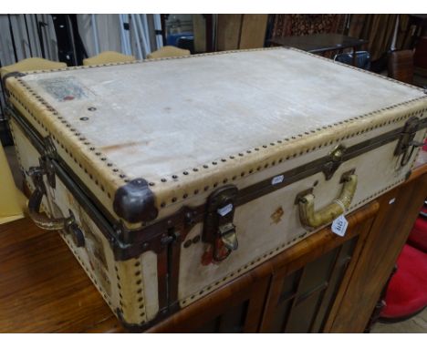 A Vintage pigskin covered suitcase with a Vintage pigskin travelling trunk/wardrobe, with brass mounts and labels, locks stam
