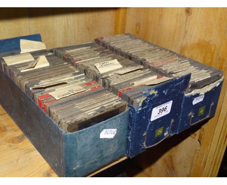3 Boxes of glass magic lantern slides.