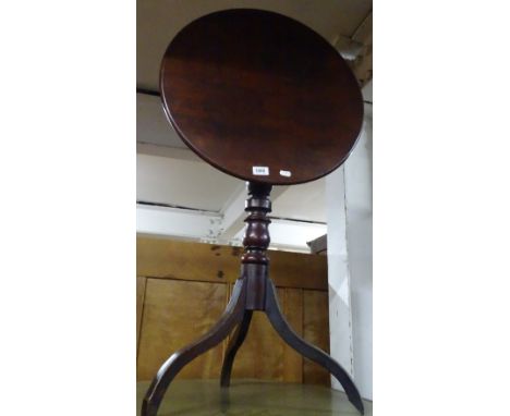 A George III mahogany tilt top tripod table, width 1'10".