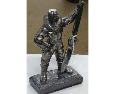 A Vintage silver plate airman figure table lighter case.