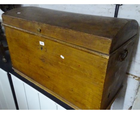 An Antique pine domed top trunk, width 2'10".