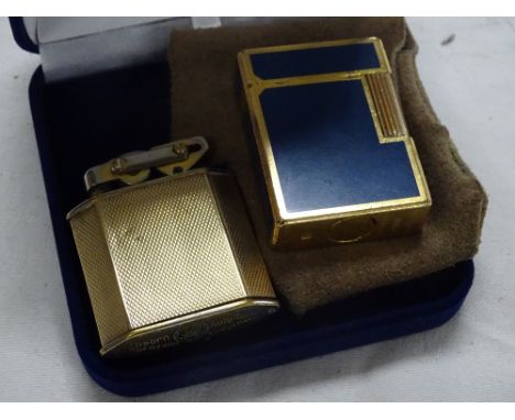 Elisorn cigarette lighter and a DuPont lighter.