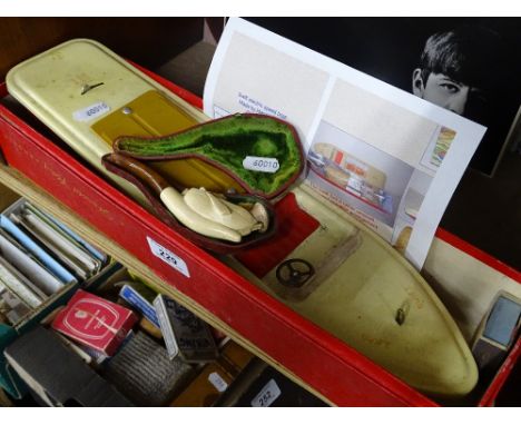 A Swift electric speedboat by Harold Flory and a Meerschaum pipe.