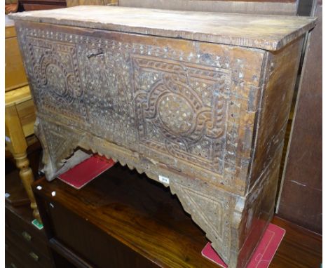 An Antique Middle Eastern carved hardwood blanket chest on stand, with allover mother of pearl inlaid decoration, width 3'3",