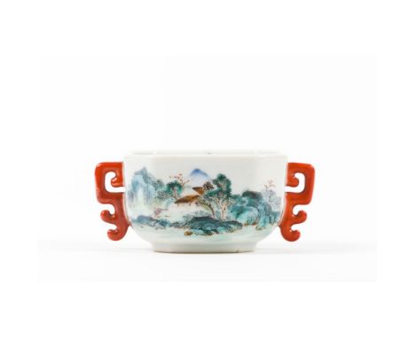 A rare Famille-Rose 'Landscape' cup and coverQing Dynasty, 18th centuryOf square section, with canted corners and raised on a