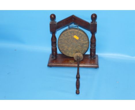 AN ANTIQUE OAK BOBBIN TURNED GONG 