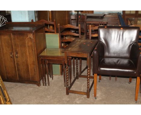 A QUANTITY OF ASSORTED FURNITURE TO INCLUDE A TWO DOOR CABINET, NEST OF TABLES, LEATHER CHAIR ETC