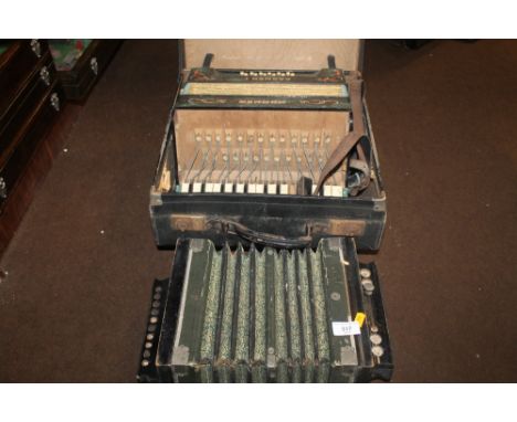 A CASED ACCORDIAN A/F TOGETHER WITH A VINTAGE SQUEEZE BOX 