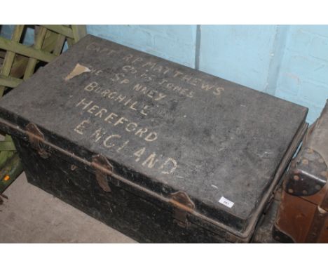 A VINTAGE METAL TRUNK
