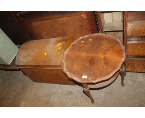 A DOMED TRUNK AND A COFFEE TABLE