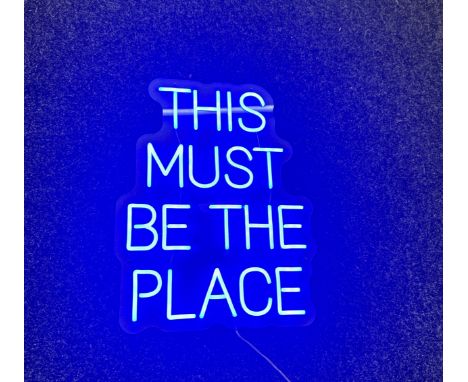 Neon beach light up "this must be the place" blue neon light, complete working order measures approximately 20 inches by 15 i