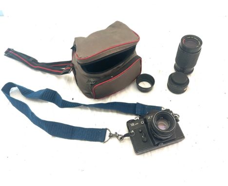 Zenit Zenith 12XP 35mm SLR Camera and a selection of lenses and a camera bag 