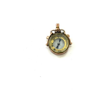 Antique 9ct rose gold compass charm in working order, approximate weight 2.8g 