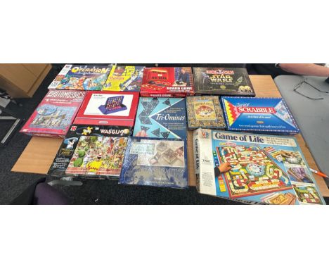 Selection of vintage and later games to include scrabble, operation, game of life etc 