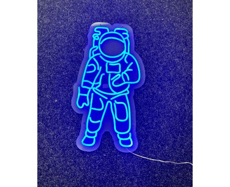 Neon beach light up "astronaut" blue neon light, complete working order measures approximately 22 inches by 10.5 inches 