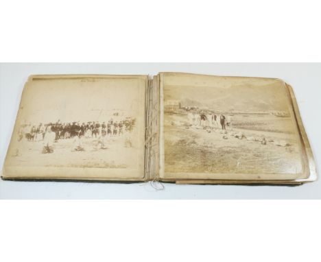 Album of late 19th century black & white photographs of Shanghai, including Beheadings, Cricket, Cycle Racing, Athletics, Win