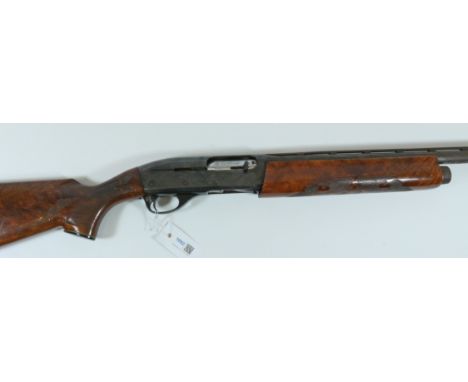 Shotgun certificate required - Remington Model 1100 three shot semi-automatic 12 bore shotgun No.L587383V, 63.5cm barrel, wel