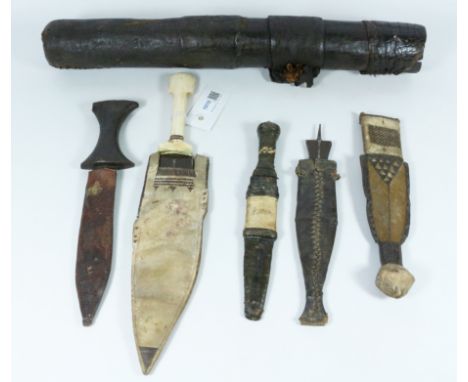 African dagger, 22cm double edged blade with bone hilt and leather scabbard; four other knives/scabbards and a leather quiver