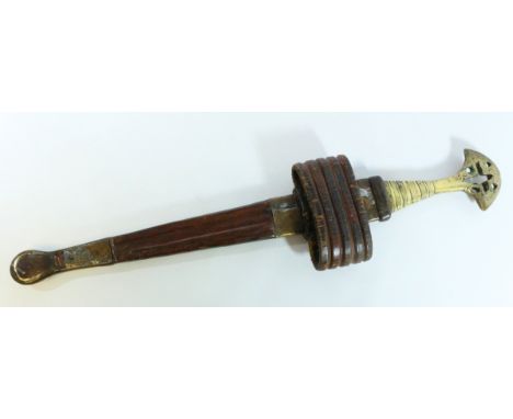 Northern Nigerian 'Nupe' arm dagger, 40cm steel blade with cast brass hilt, matching brass mounted leather scabbard 56cm over