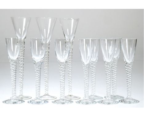 11 Holmegaard-Aquavitgläser, z.T. im Boden sign. "HG", gedrehter, spiralenförmiger Schaft, H. 16,5-22 cm