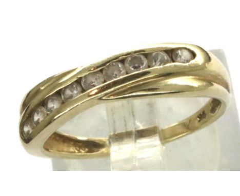 9ct gold stone set CZ half eternity ring, size M, 1.6g. P&amp;P Group 1 (£14+VAT for the first lot and £1+VAT for subsequent 