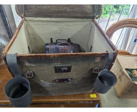 A vintage canvas trunk A/F, 50cm x 40cm with initials NLF to top, along with a wooden barrel with handle and a pint and anoth
