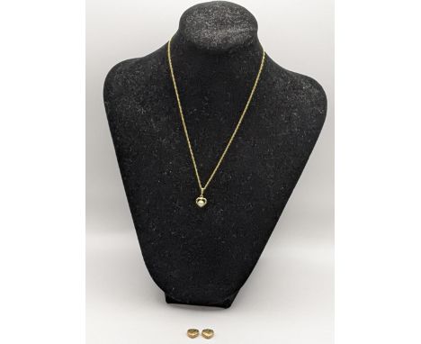 A 9ct gold pendant set with a pearl, a necklace and two 9ct gold heart pendants, 2.4gLocation: 