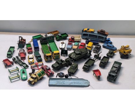 A group of mostly Dinky toys to include Dinky Bedford tipper, Connaught, Cunningham C-5R, TV Roving Eye, Coventry Climax fork