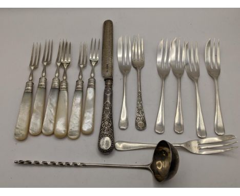 Mixed silver to include cake forks, Scottish silver ladle, mother of pearl handled forks and other items, weight excluding kn