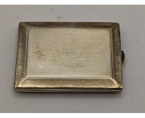 A 1920s silver vesta case having engine turned decoration and inscription to the inside, hallmarked Birmingham 1926, 39.8g, L