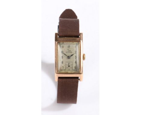 Record nine carat gold gentleman's wristwatch, the signed silver dial with Arabic numerals, outer minutes track and subsidiar