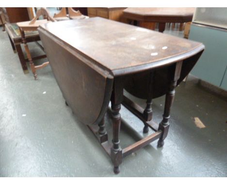 A 19th century oak gate leg table, 71cmH