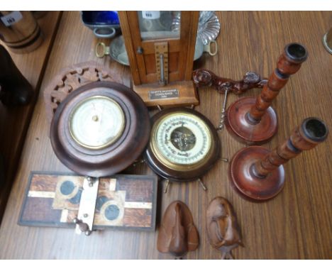 A mixed lot of various wooden items to include candlestick holders, a bottle opener and a lathe (11)