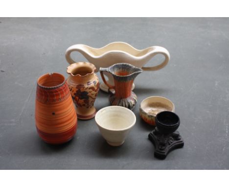 A collection of china and pottery to include a ceramic flower vase of serpentine trophy form with loop handles attributed to 