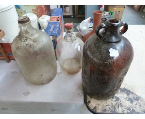 Three vintage cider distillery bottles, one reading Pottle