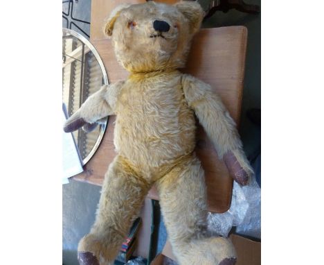 A large vintage Chad Valley Co. mohair stuffed teddy bear (worn label to left paw, ear part detached), 70cmH