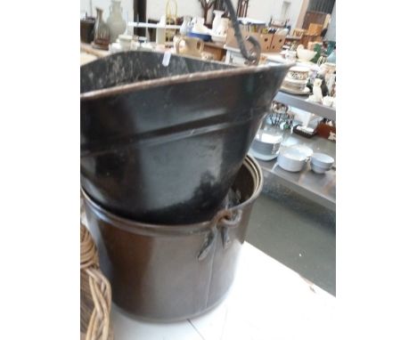 A vintage copper basket together with a vintage coal scuttle