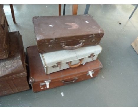 Three vintage suitcases