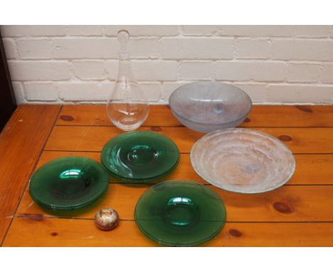 A quantity of glassware to include a clear glass decanter and stopper, eight green glass plates, a light blue glass bowl deco