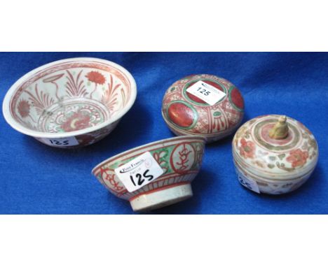 A group of Chinese Wucai enamel decorated, porcelain items comprising: two footed bowls and two cushion shaped bowls and cove