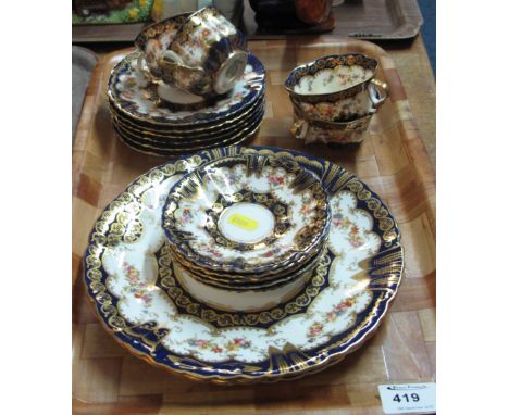 Tray of Crown Staffordshire bone china tea ware items on a white ground with cobalt blue and gilt floral decoration comprisin