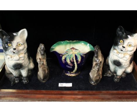 Pair of pottery seated cats, together with pair of pottery rearing horses and pottery planter.  (5)