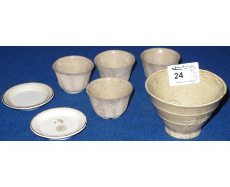 A group of assorted Chinese ceramic items to include four leaf design moulded sake cups having seal marks to bases, a conical