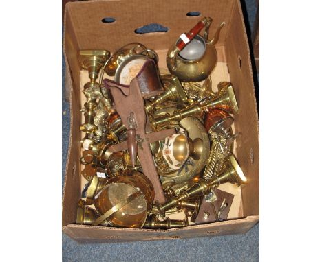 Box of assorted mainly brassware to include various candle sticks, helmet shaped miniature coal bucket, brass cats, trays, as