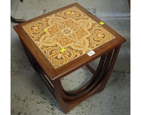 1970s teak tile topped nest of three tables.