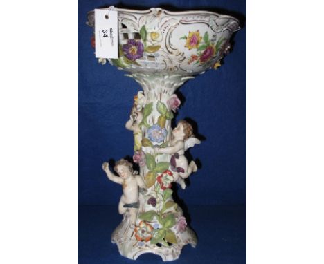 Large Dresden porcelain cherub mounted flower encrusted table centre piece bowl.  Printed marks.