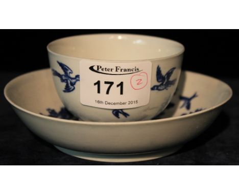 18th Century first period Worcester porcelain tea bowl and saucer overall decorated in blue depicting birds within a landscap