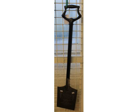 A silver plated and ebonised wooden commemorative spade presented to Miss Janet Loveluck by Mr Phillip Gaylard on behalf of t