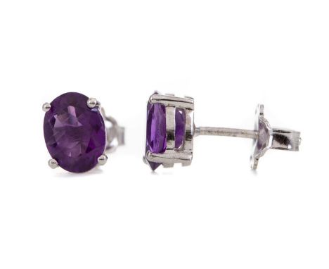 PAIR OF AMETHYST EARRINGS,set with oval stones, in silver